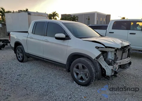 2023 Honda Ridgeline Rtl from USA, damaged, VIN 5FPYK3F53PB021445